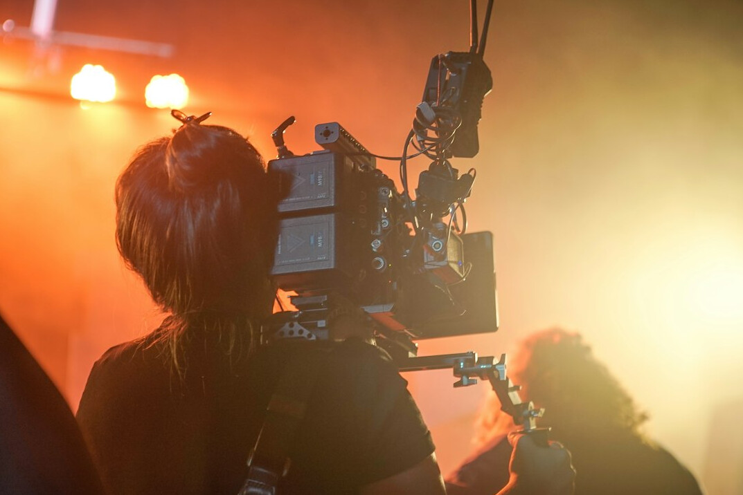 Television studio with cameras and lighting rig ready for a live show