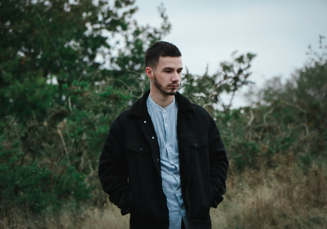 Portrait of a bearded man in a casual jacket